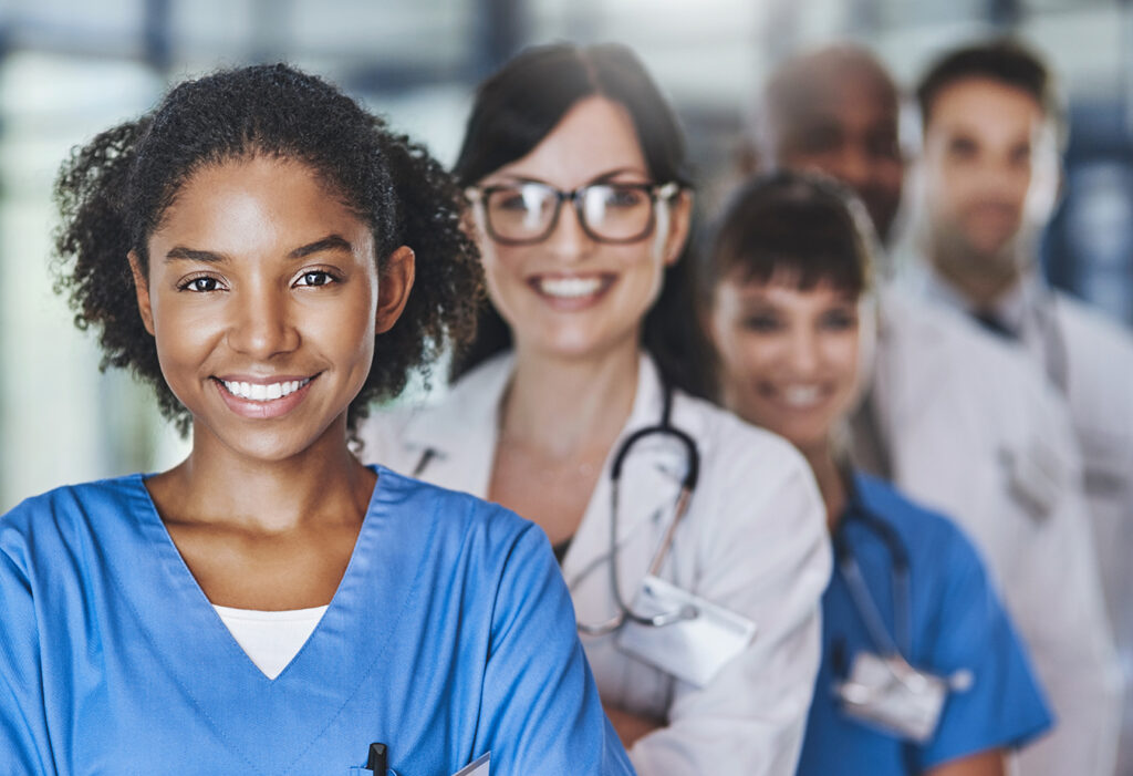 Portrait of a diverse team of doctors standing together in a hospital